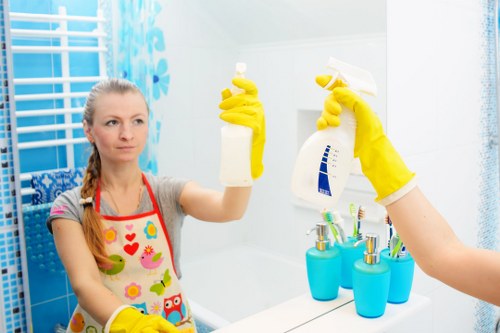Cleaning equipment and a professional cleaner preparing for a service appointment