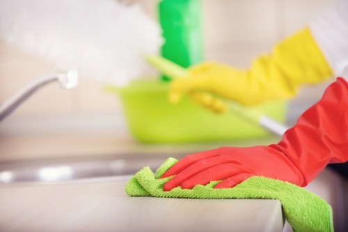 Technician removing dust and stains from a mattress